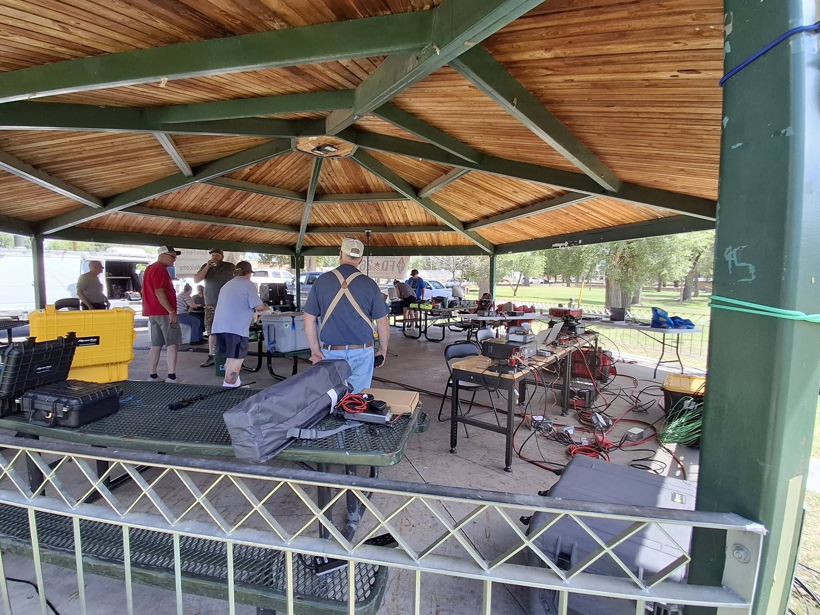 Wide view of the pondside gazebo with stations set up during Field Day.